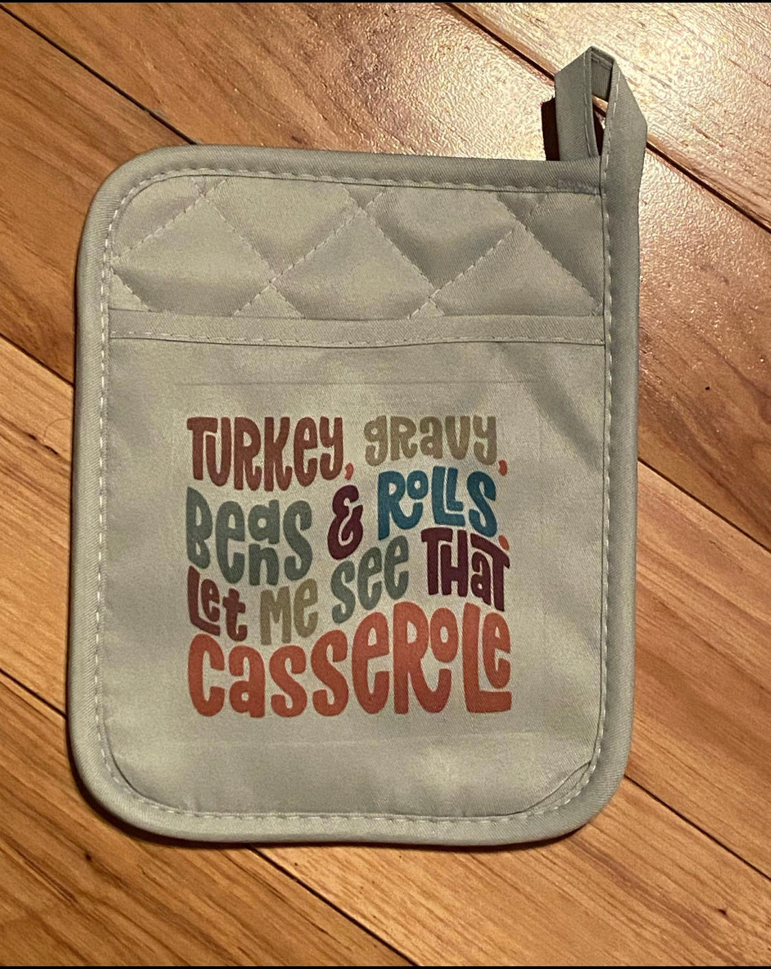 Turkey gravy beans and rolls. Let me see that casserole pot holder