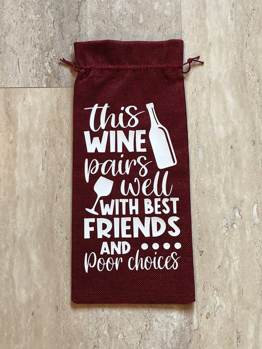 This wine pairs best with best friends and poor choices burlap wine bag with drawstring in merlot and natural burlap color