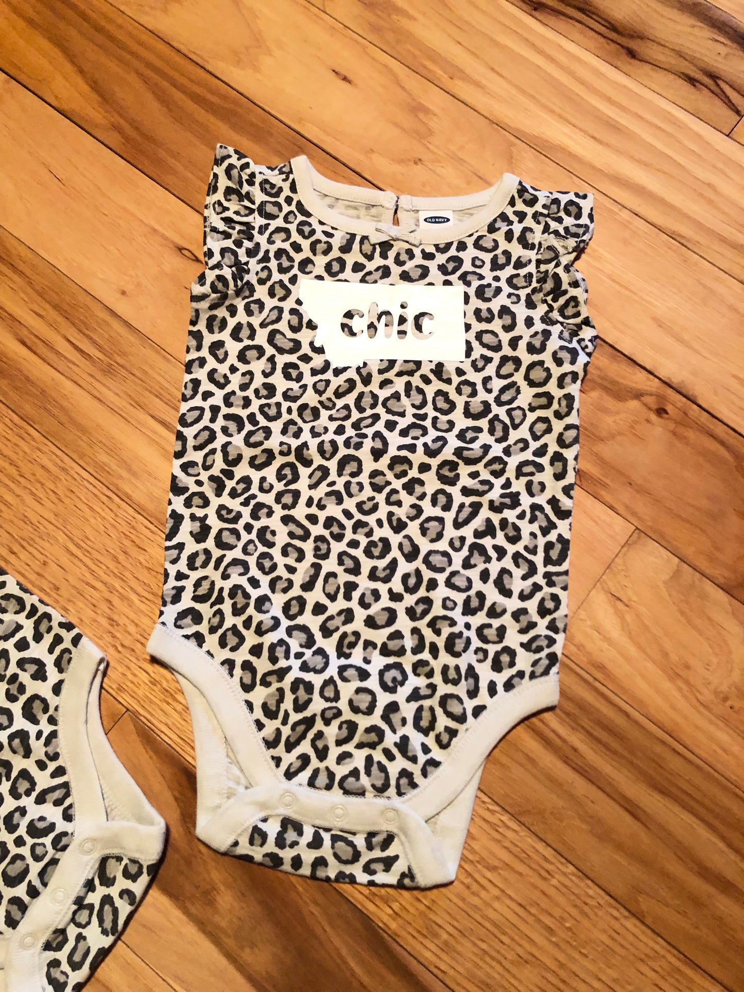 Montana chic infant onesie, leopard print